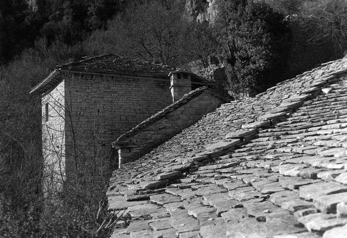 The old stone roof and buildings of Agios Paraskevi monastery in Zagorohoria
