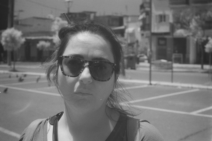 A portrait of Vicky with sunglasses