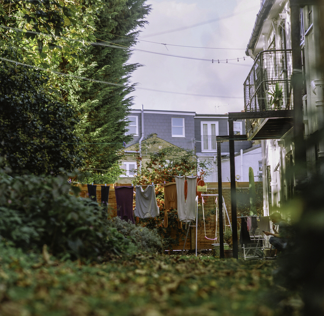 Suburban back garden along the back of some flats in england