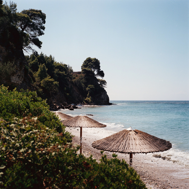 Megalos Mourtias beach with straw umbrellas