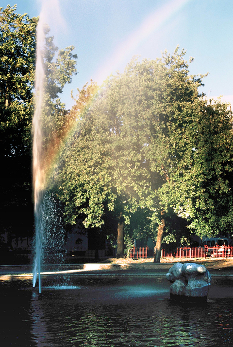 Fountain creating a rainbow in the Kalamata Municipal Railway Park