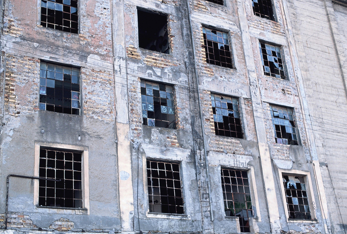 Industrial building with smashed windows