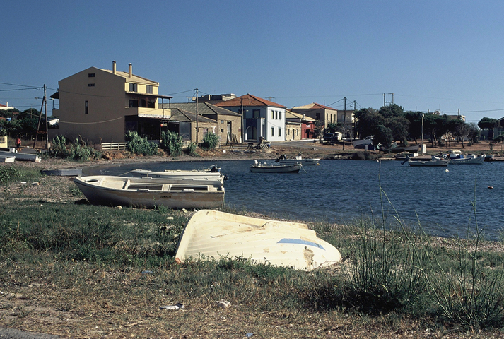 Boats and houses at the harbour of Marathopoli